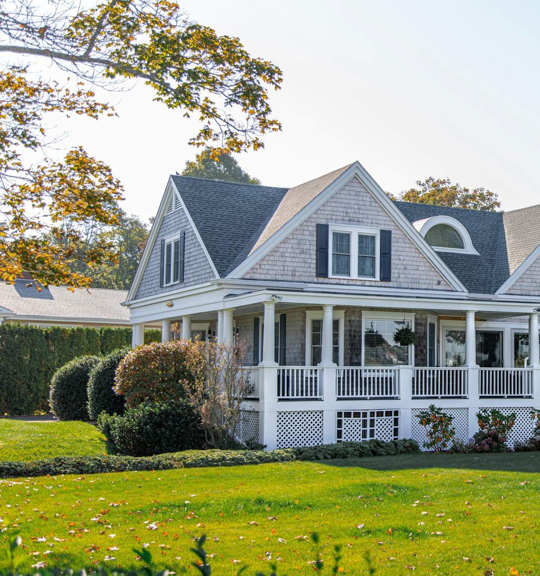 Shingle roof and covered porch on a residential home
